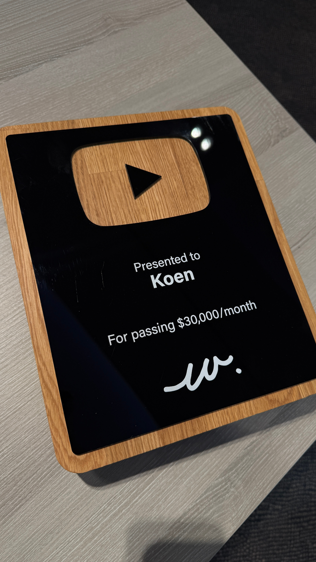 Koen receiving a 30K per month award at the live event