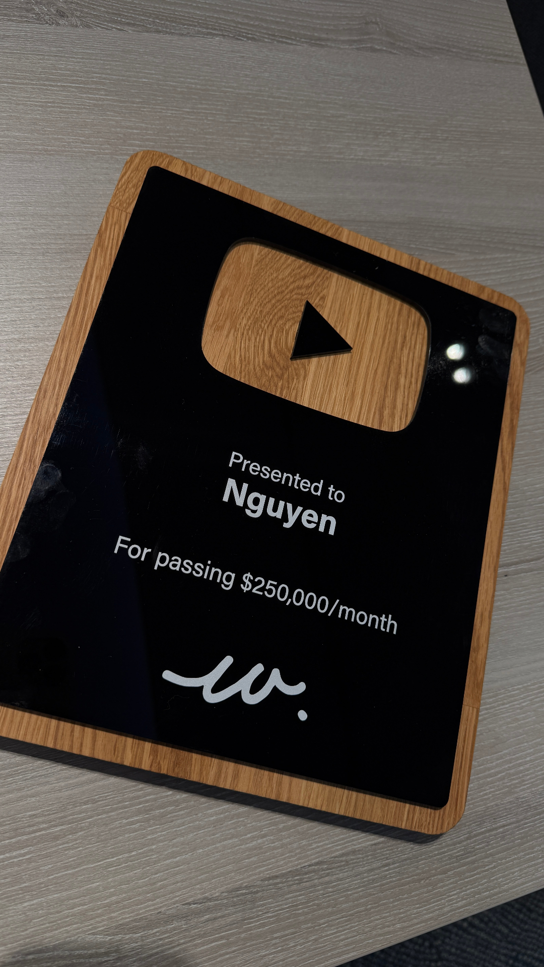 Nguyen receiving a 250K per month award at the live event